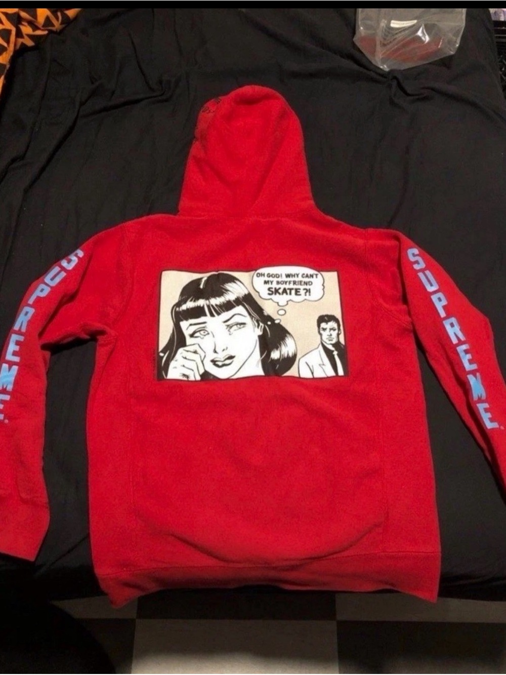 Supreme Red Hoodie with Comic Panel and Light Blue Sleeve Logo